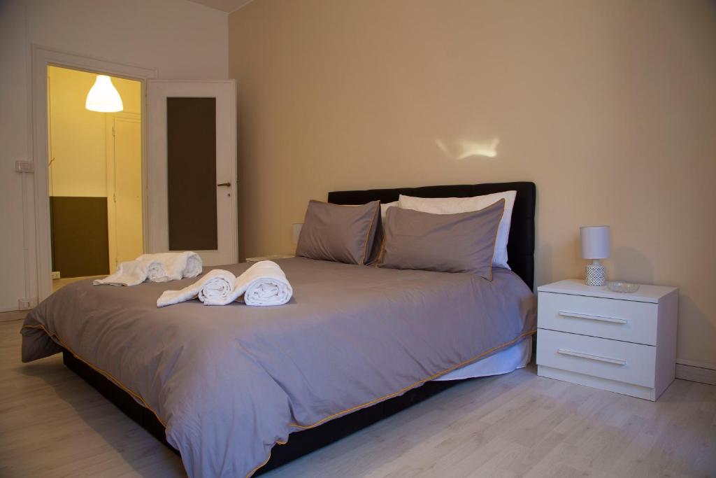 Łóżko lub łóżka w pokoju w obiekcie San Silverio Luxury House