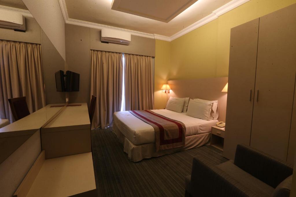 Postel nebo postele na pokoji v ubytování Padova Hotel