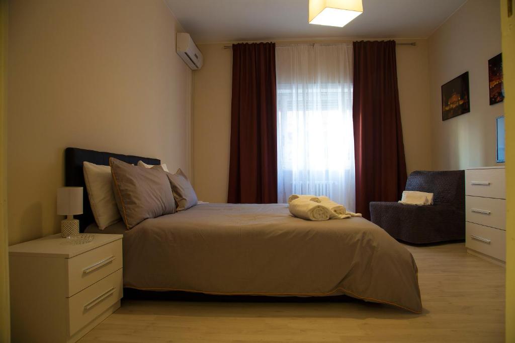 Łóżko lub łóżka w pokoju w obiekcie San Silverio Luxury House