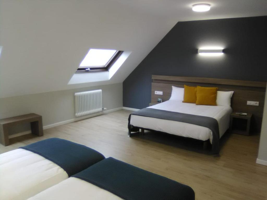 Cama o camas de una habitación en Hotel Alda Estación Pontevedra