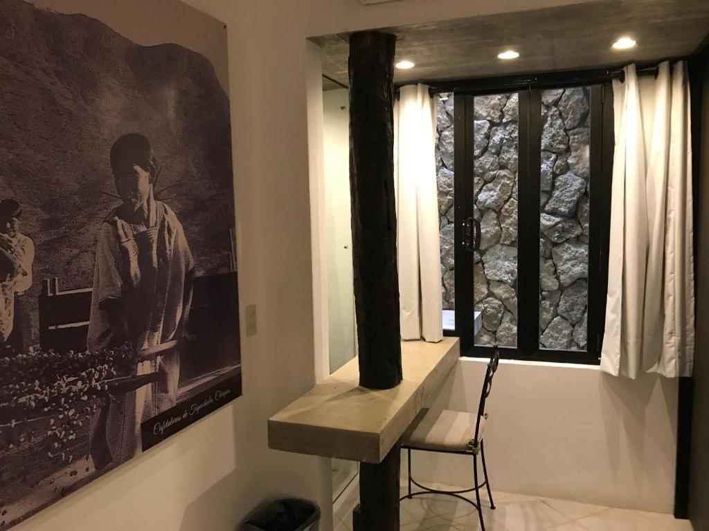 Posezení v ubytování Hotel Maya Rue