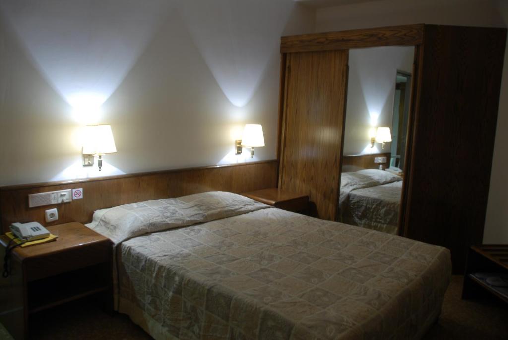 Postel nebo postele na pokoji v ubytování Derici Hotel