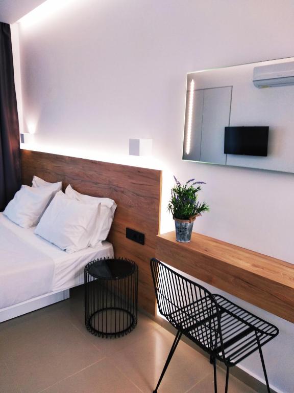 Postel nebo postele na pokoji v ubytování Aestas Apartments