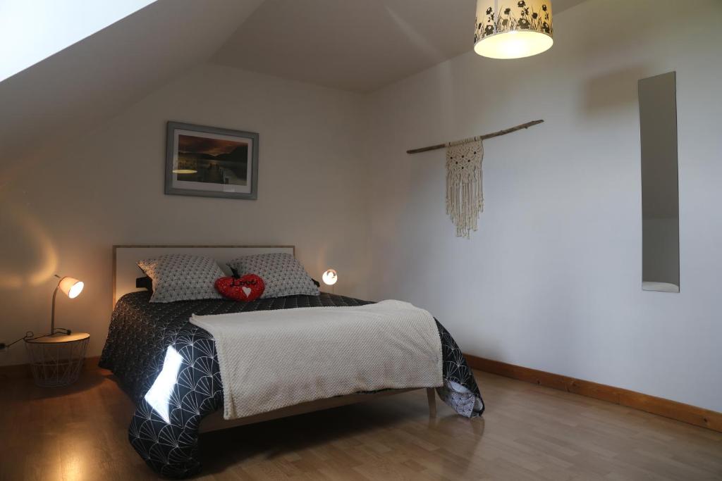 Postel nebo postele na pokoji v ubytování Gîte Cocantin