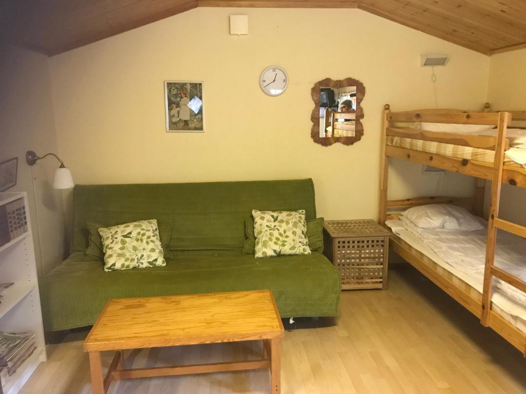 Postel nebo postele na pokoji v ubytování Ullstorps Stugor