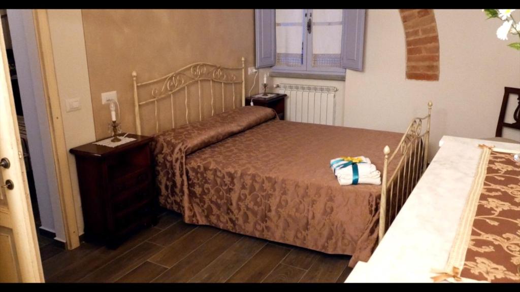 Łóżko lub łóżka w pokoju w obiekcie Villa Paglicci Reattelli Agriturismo