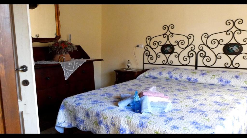 Łóżko lub łóżka w pokoju w obiekcie Villa Paglicci Reattelli Agriturismo
