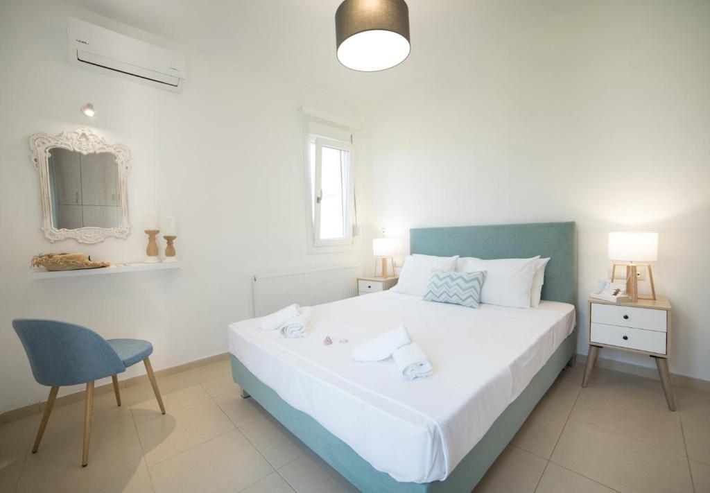 Posteľ alebo postele v izbe v ubytovaní Elounda Dream House