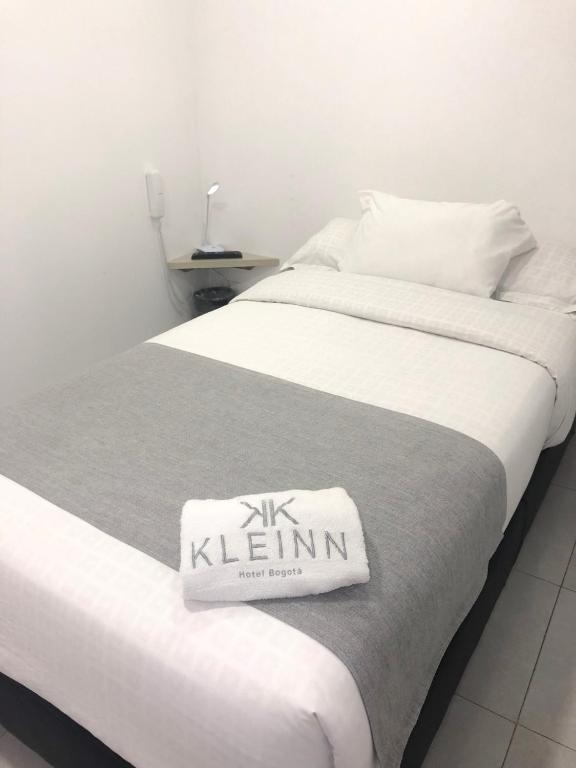 Postel nebo postele na pokoji v ubytování KLEINN HOTEL BOGOTÁ