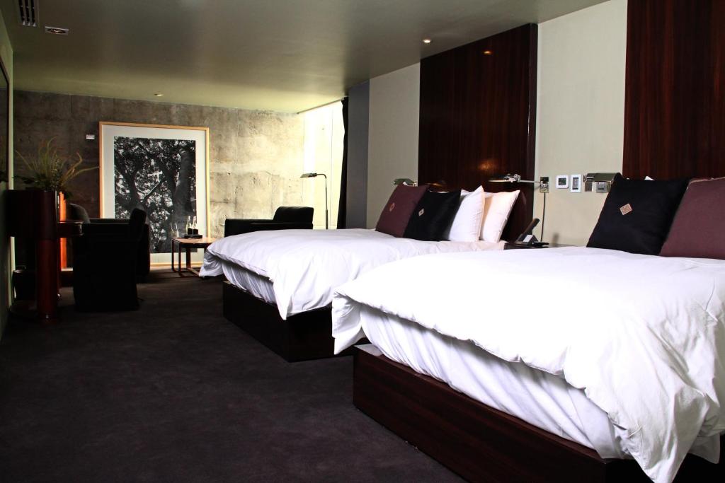 Postel nebo postele na pokoji v ubytování Demetria Hotel