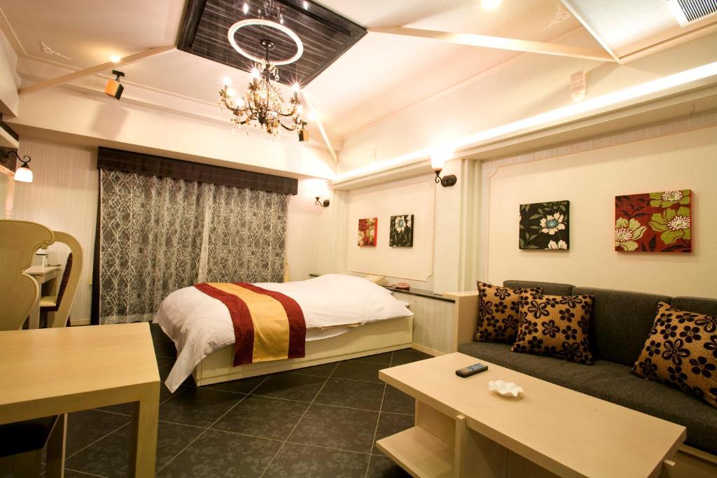 Postel nebo postele na pokoji v ubytování Hotel Bintang Pari Resort (Adult Only)