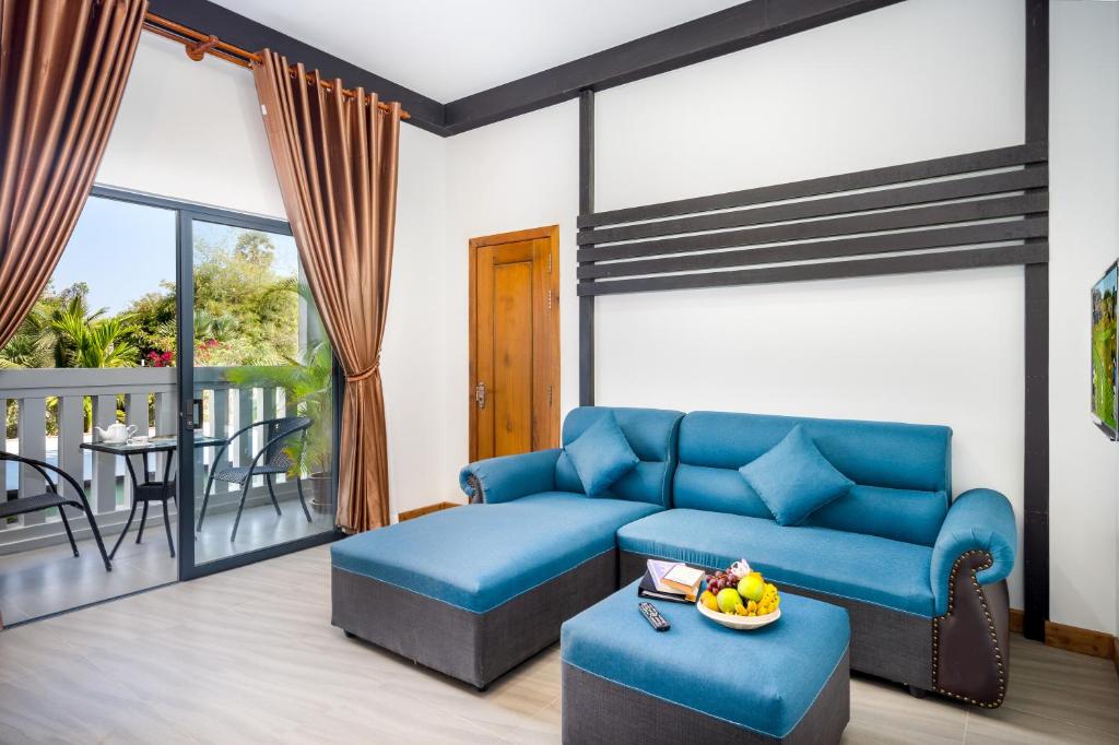 Posezení v ubytování Reveal Angkor Hotel