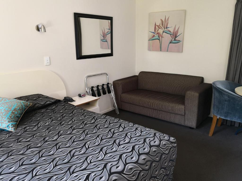 Postel nebo postele na pokoji v ubytování Annabelle Court Motel