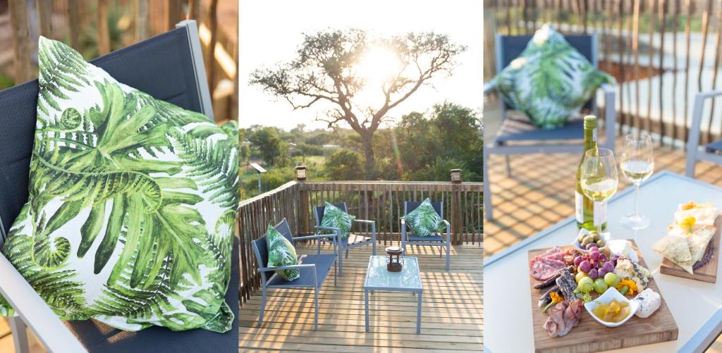 a table with a glass of wine and a plate of fruit at Route 40 in Hoedspruit