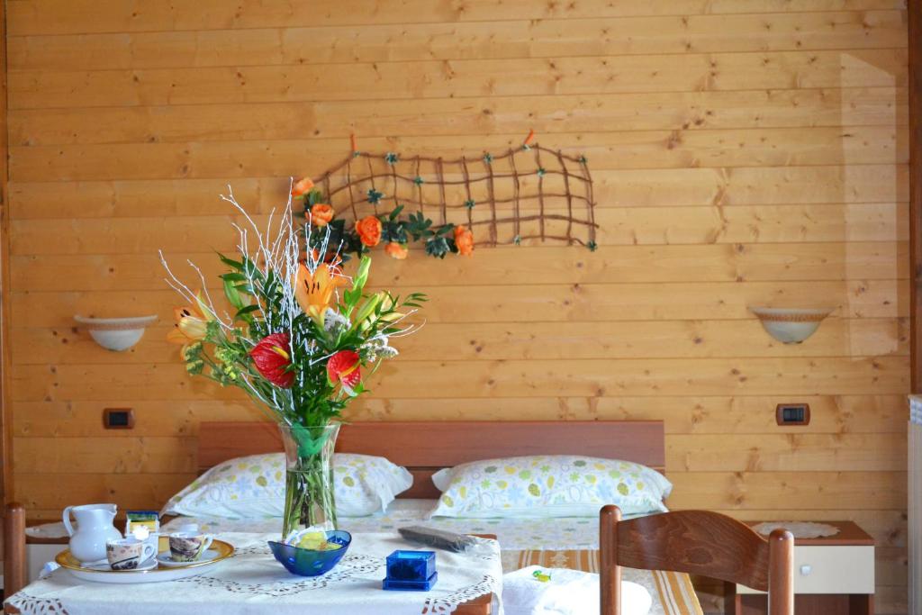 Postel nebo postele na pokoji v ubytování BeB Casa Di Lety