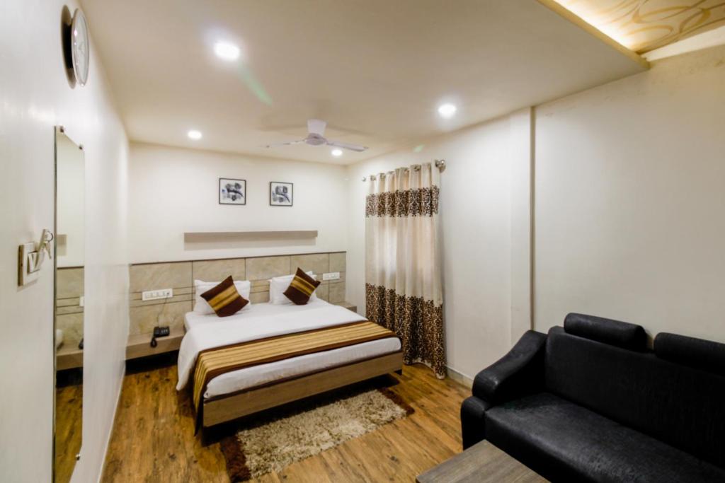 Postel nebo postele na pokoji v ubytování Hotel City Inn