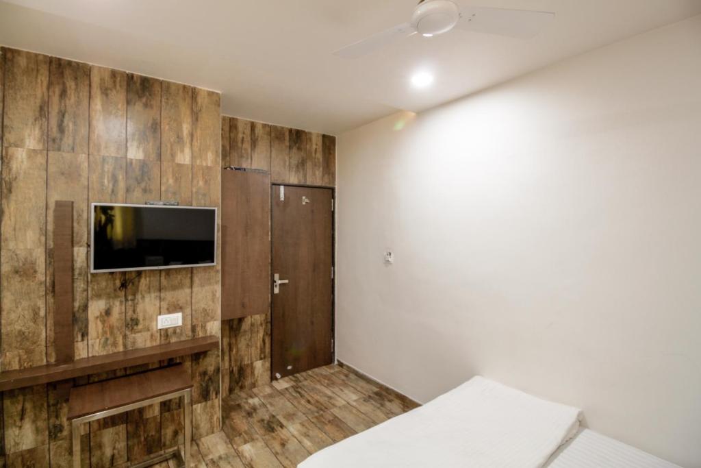 Postel nebo postele na pokoji v ubytování Hotel City Inn