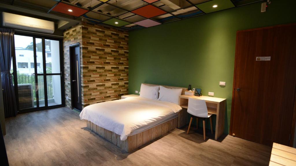 Postel nebo postele na pokoji v ubytování Chi Chu B&B