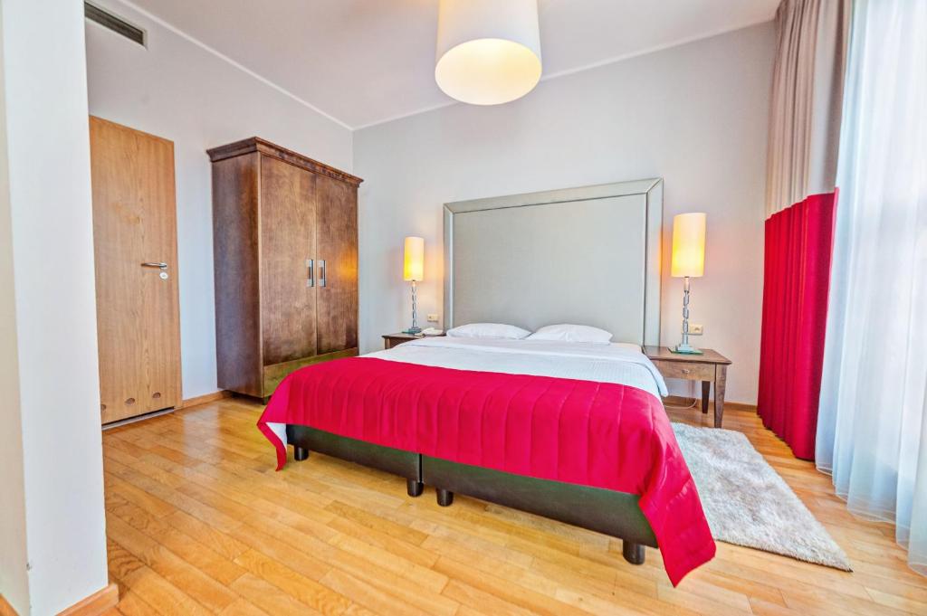Posteľ alebo postele v izbe v ubytovaní Don Prestige Residence