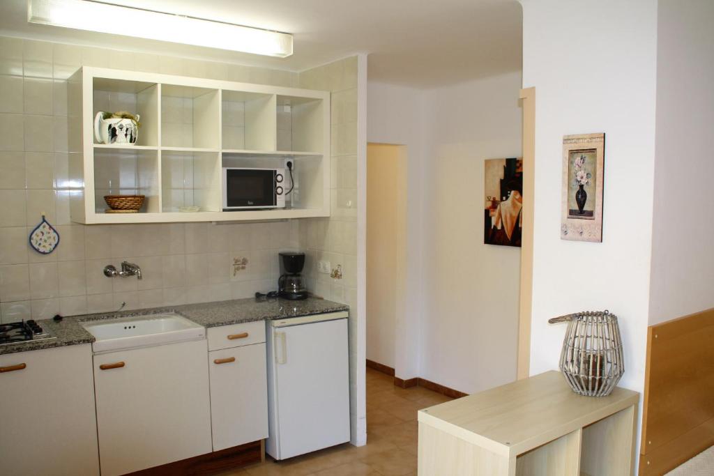 Kuchyň nebo kuchyňský kout v ubytování Apartaments Margarita Sabina Pinell