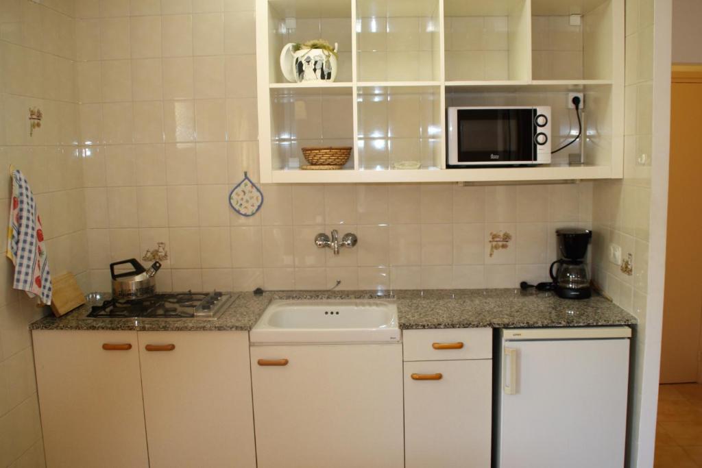 Kuchyň nebo kuchyňský kout v ubytování Apartaments Margarita Sabina Pinell
