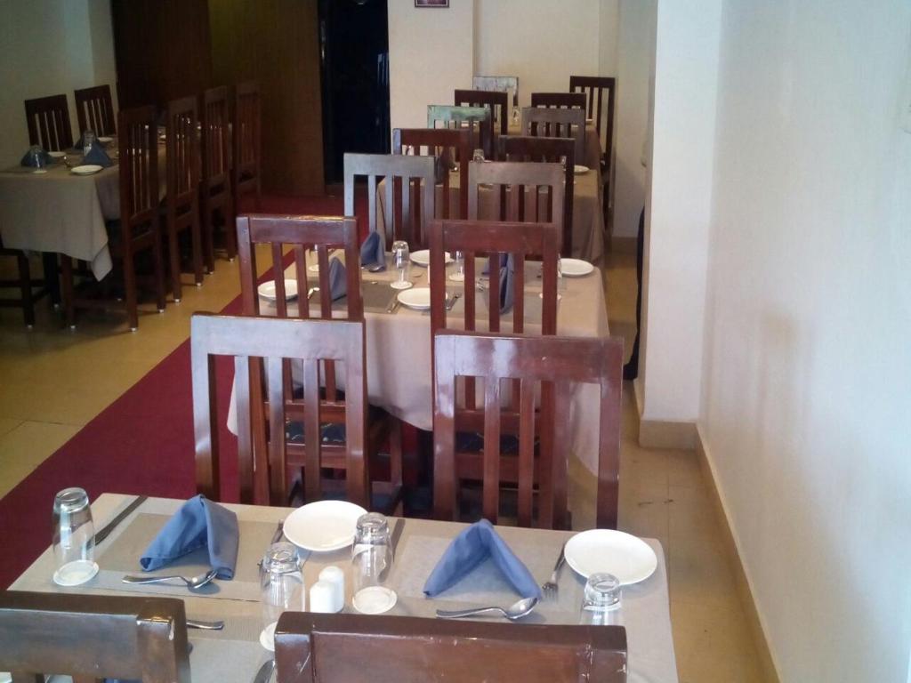 Restaurace v ubytování Creek Hotel - Panaji
