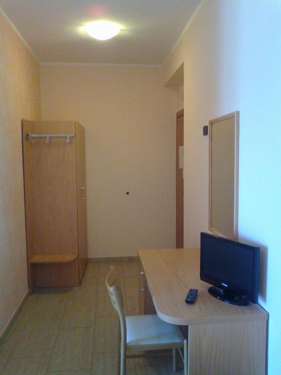 Telewizja i/lub zestaw kina domowego w obiekcie Life Hotel