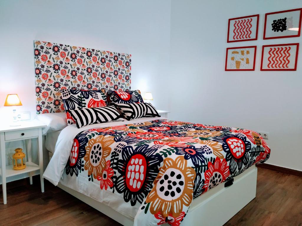 Postel nebo postele na pokoji v ubytování Loft Azahar junto a Puente Romano