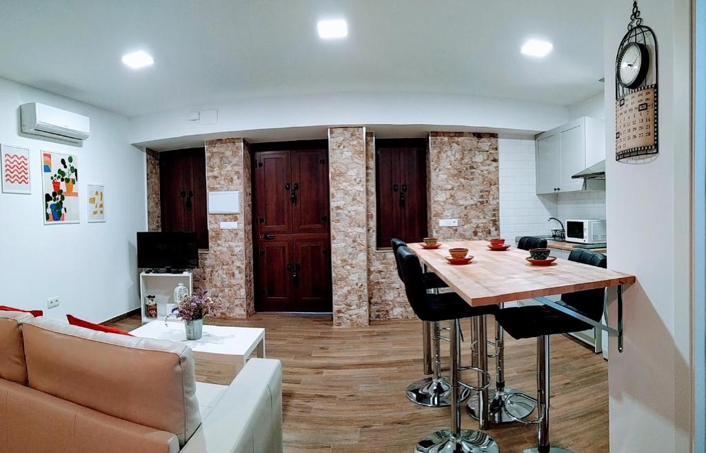 TV a/nebo společenská místnost v ubytování Loft Azahar junto a Puente Romano