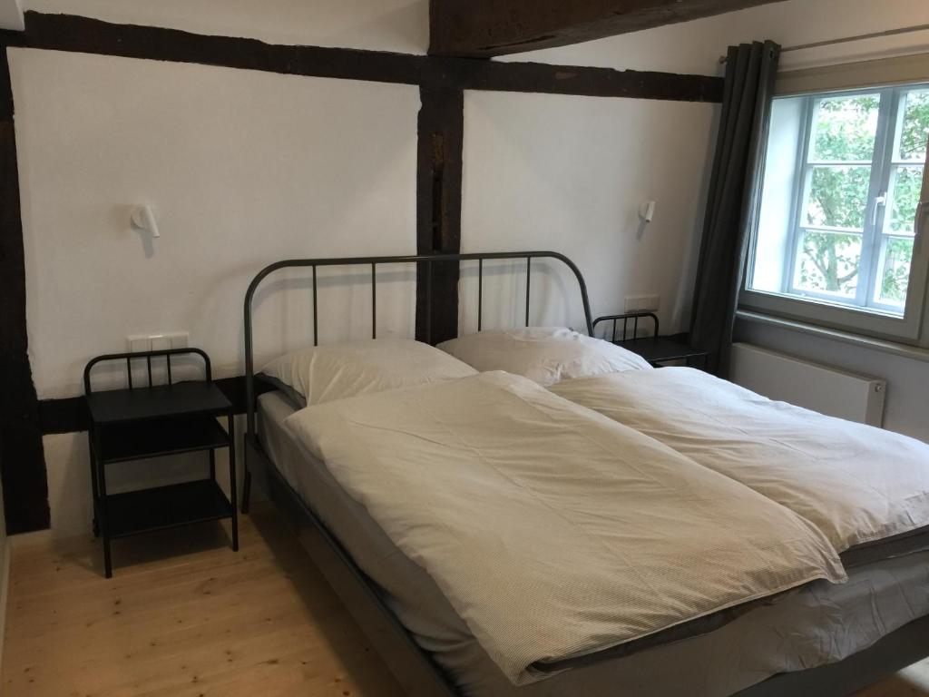Posteľ alebo postele v izbe v ubytovaní Apartment Rampendal im Lemgoer Fachwerkhäuschen