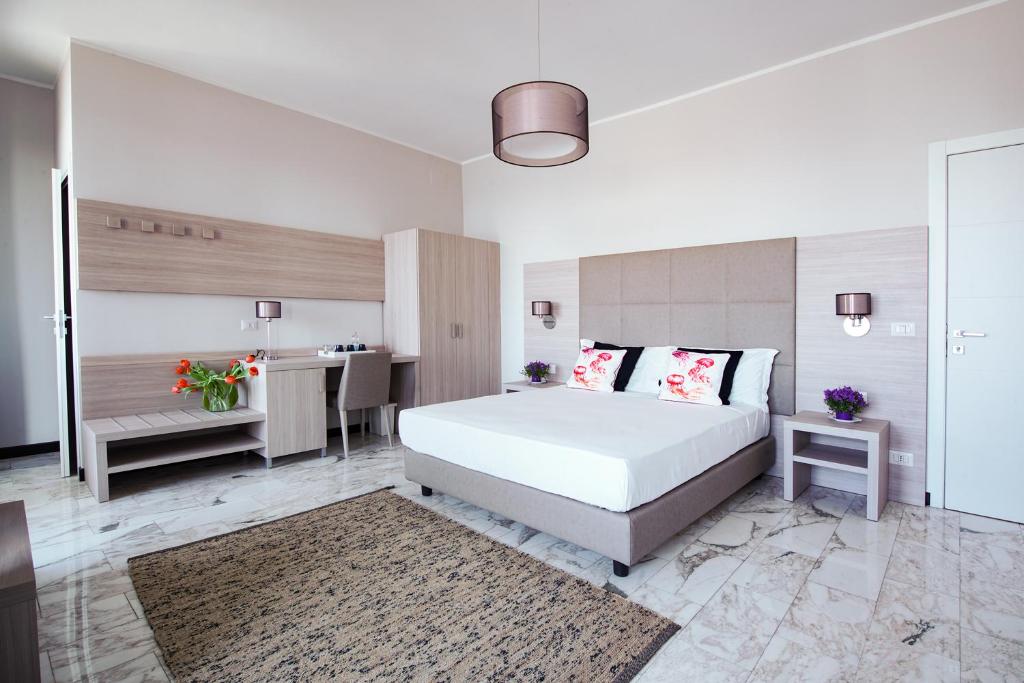 Postel nebo postele na pokoji v ubytování Bluripa Guest House