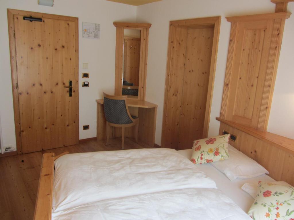 Postel nebo postele na pokoji v ubytování Park Hotel Aurora