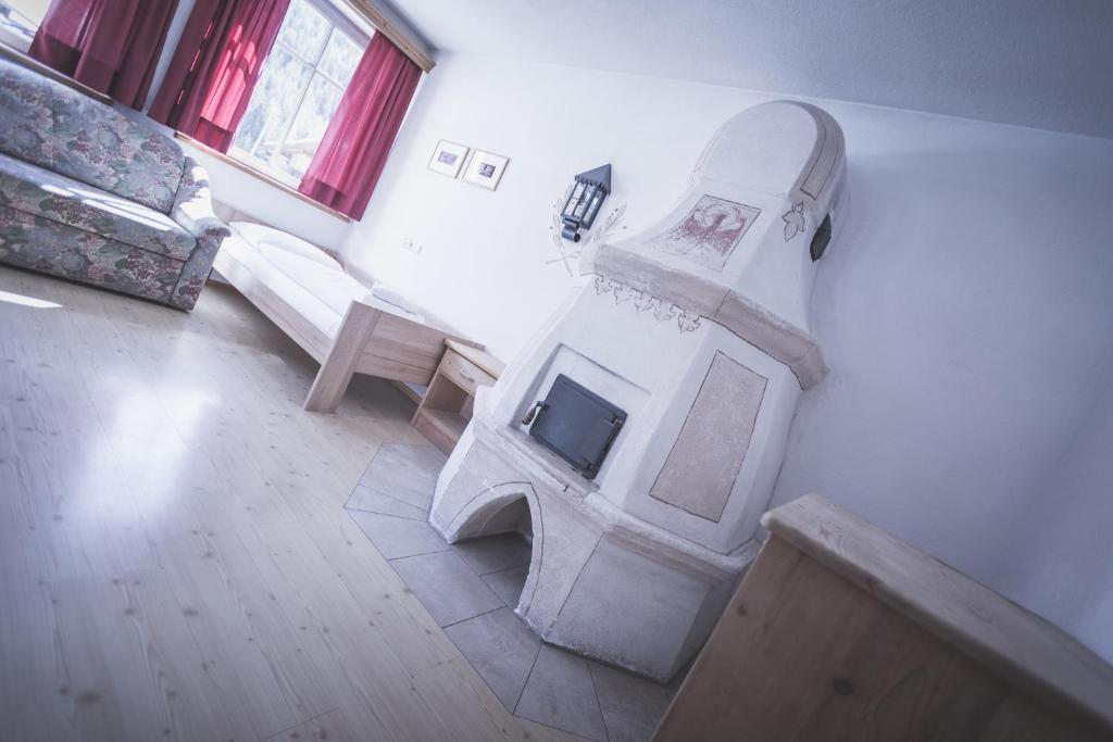 Postel nebo postele na pokoji v ubytování Almhaus Pfister OHG