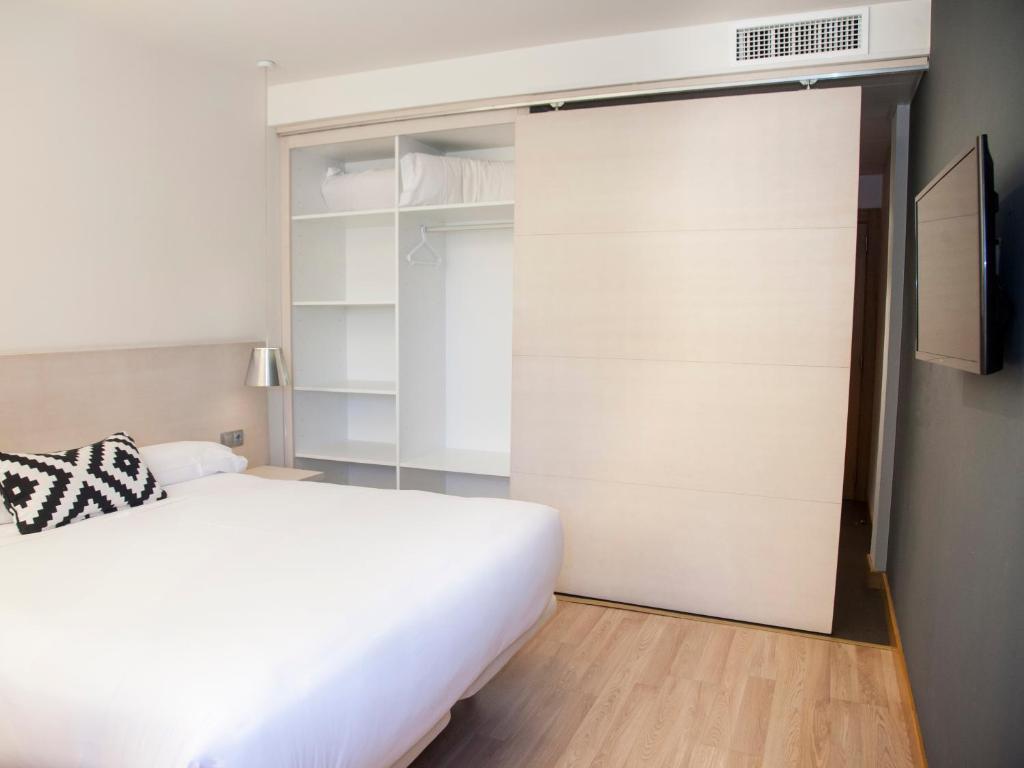 Postel nebo postele na pokoji v ubytování Hotel Restaurante Cadosa