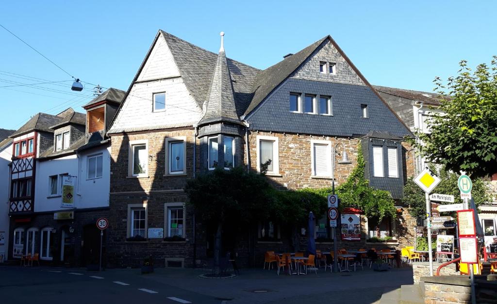 a large building on the corner of a street at Haus Born in Treis-Karden