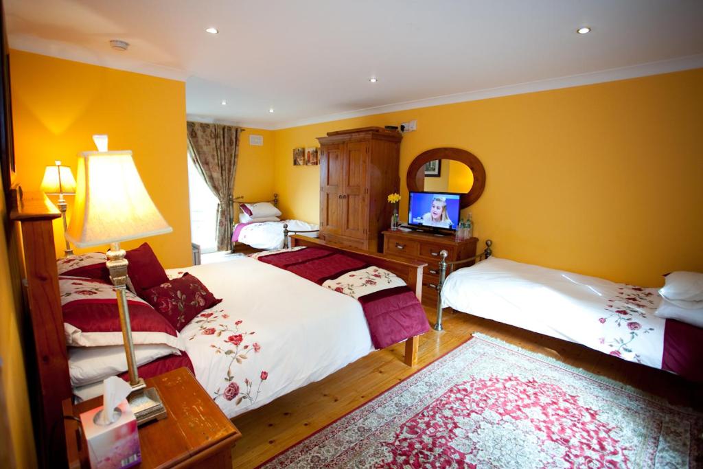 Postel nebo postele na pokoji v ubytování Evergreen Bed & Breakfast