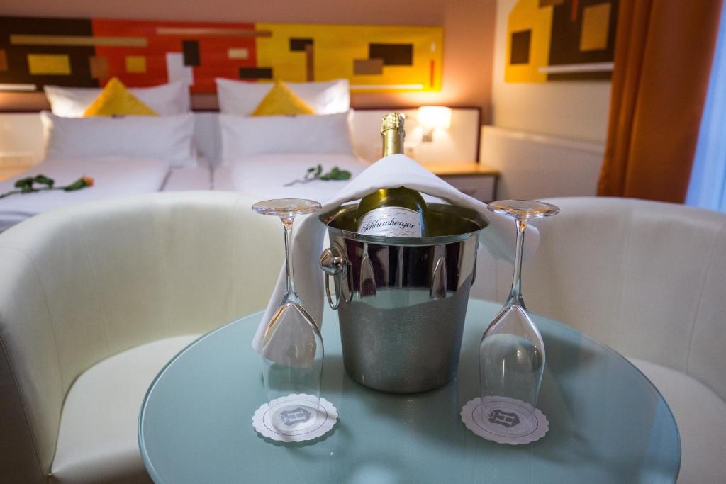 Postel nebo postele na pokoji v ubytování Hotel Residenz Hössinger