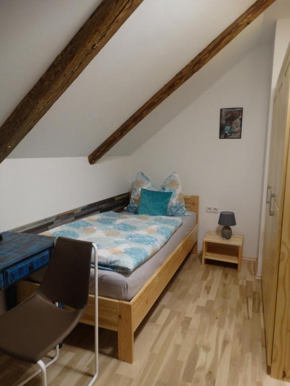 A bed or beds in a room at Alpenapartments Steiermark