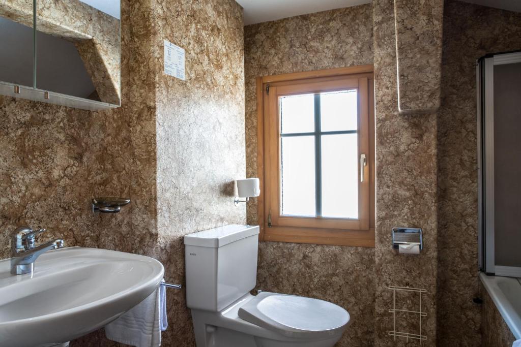 Koupelna v ubytování Hotel Burgener