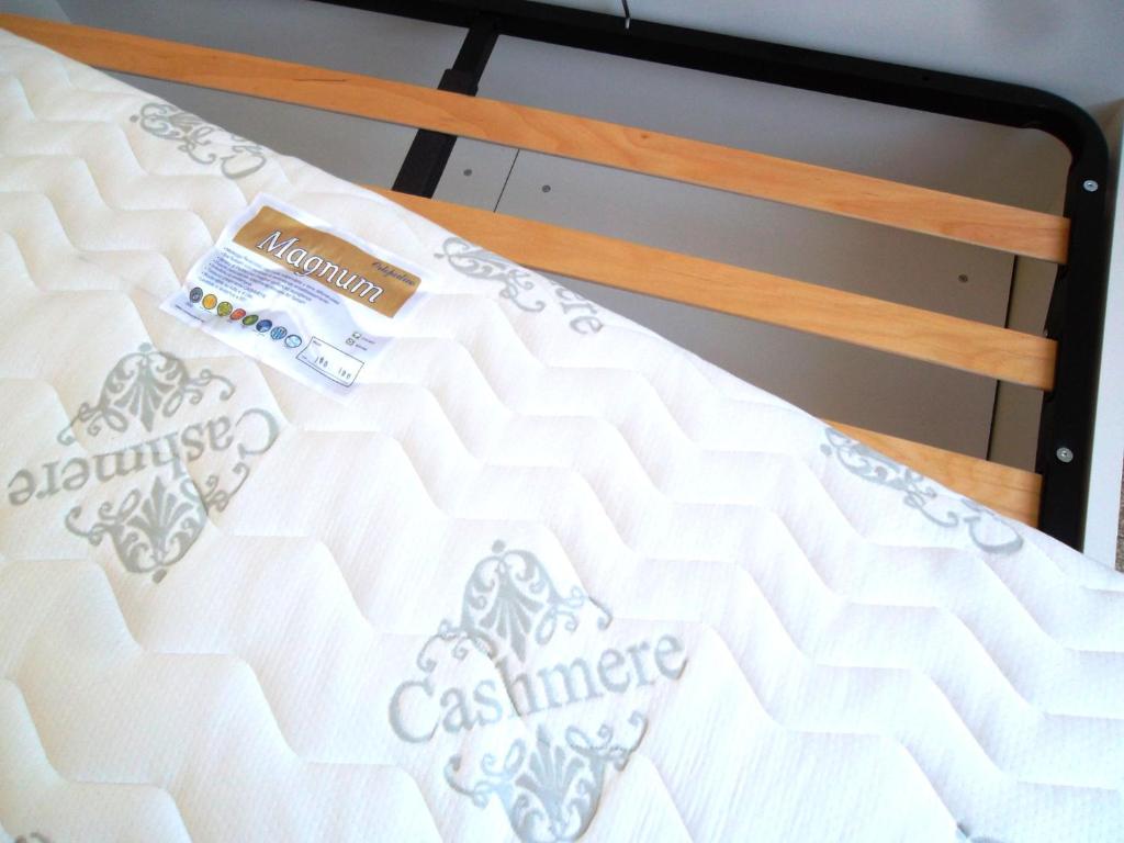 A bed or beds in a room at Grottammare mon amour Marina Grande