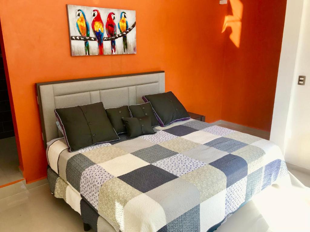 Postel nebo postele na pokoji v ubytování Ecocamping Yaxche