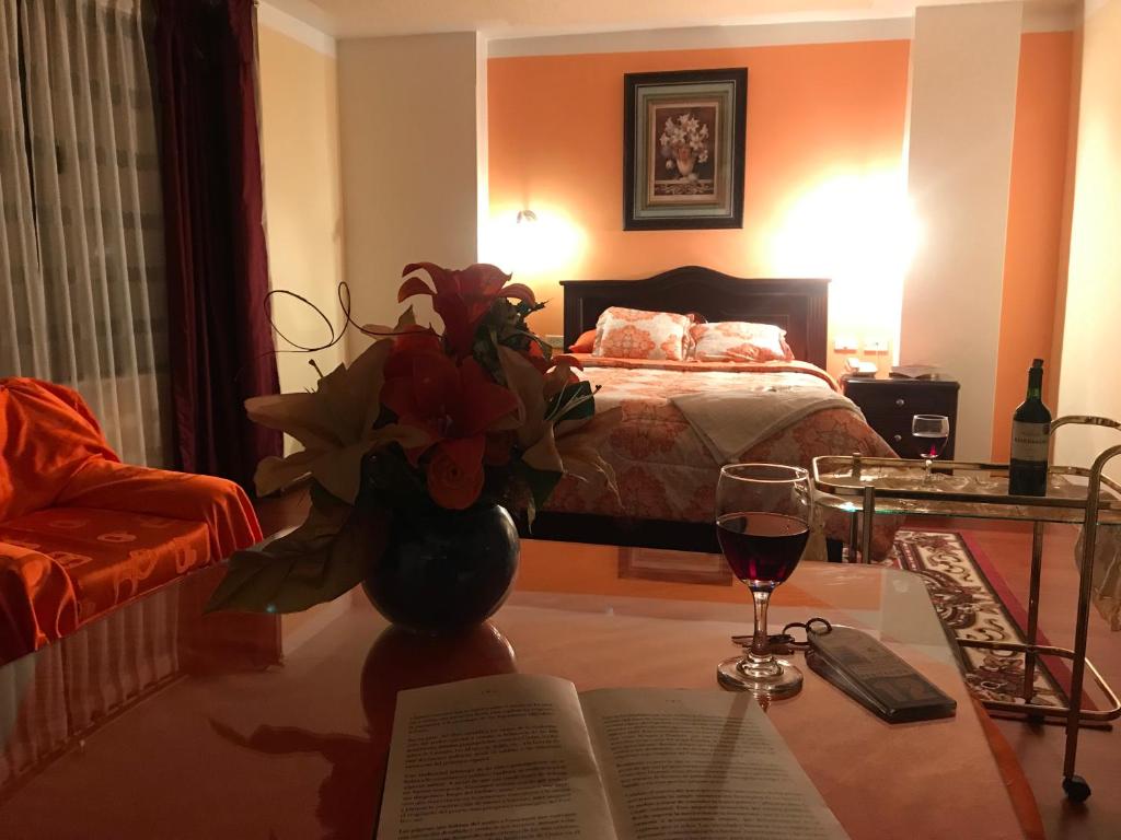 Postel nebo postele na pokoji v ubytování Hotel Los Ilinizas