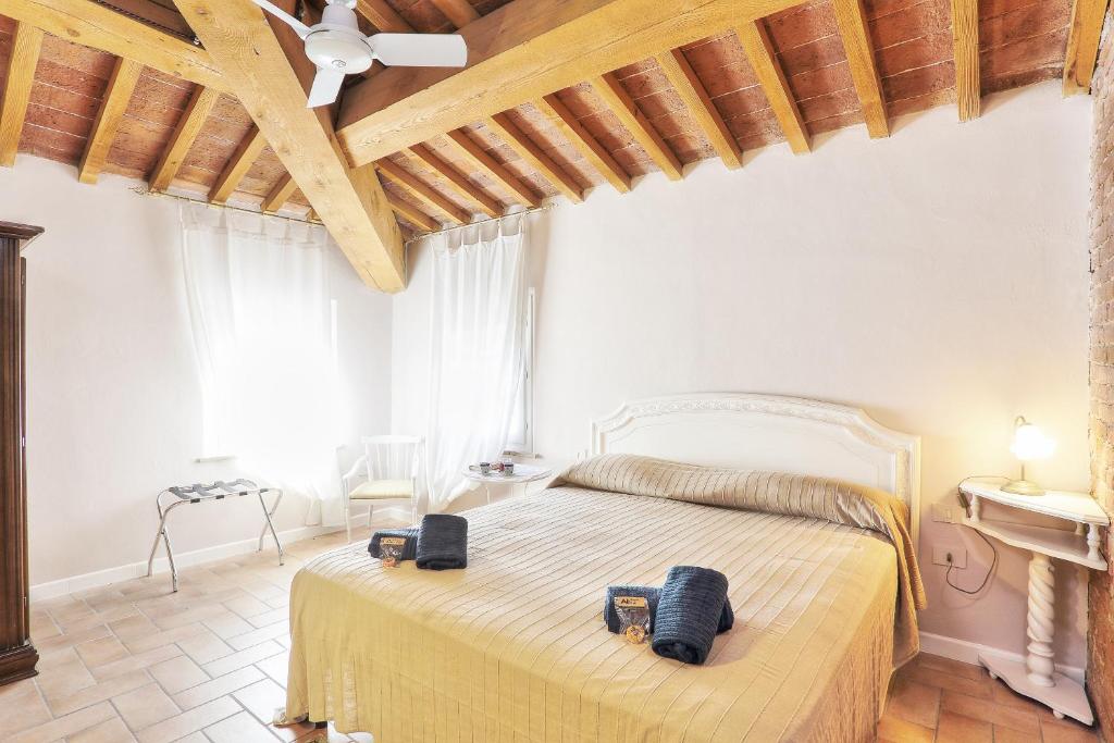 Postel nebo postele na pokoji v ubytování Borgo di Alica