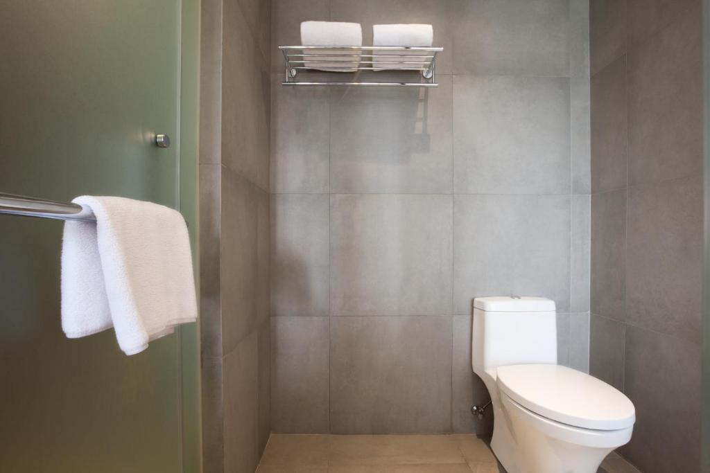 Koupelna v ubytování Hotel Santika Premiere Bandara Palembang