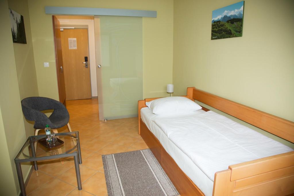 Postel nebo postele na pokoji v ubytování Motel Skalka
