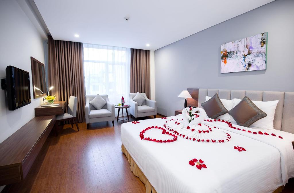 Giường trong phòng chung tại Muong Thanh Sapa Hotel