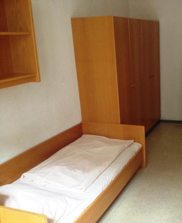 Postel nebo postele na pokoji v ubytování Porzellaneum