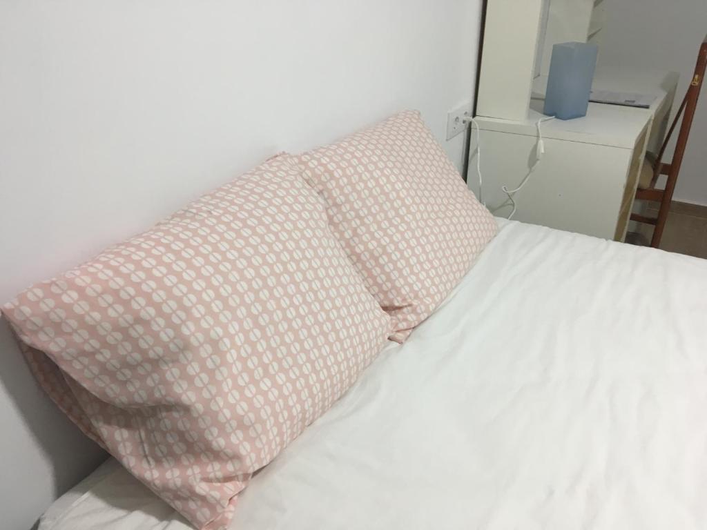 Postel nebo postele na pokoji v ubytování Casa Conchita