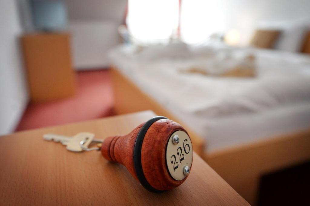 Postel nebo postele na pokoji v ubytování Panorama Hotel Noszvaj