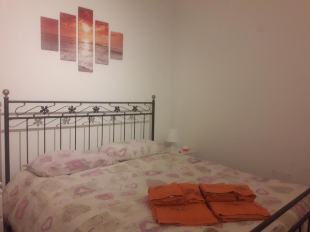 Postel nebo postele na pokoji v ubytování Sole Mio Rooms & Breakfast